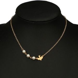 Brand new dainty gold dove & pearl necklace